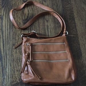 Tan zipper front cross-body bag